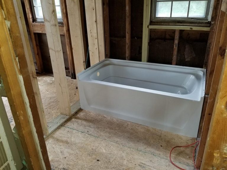 An under construction bathroom with bathtub