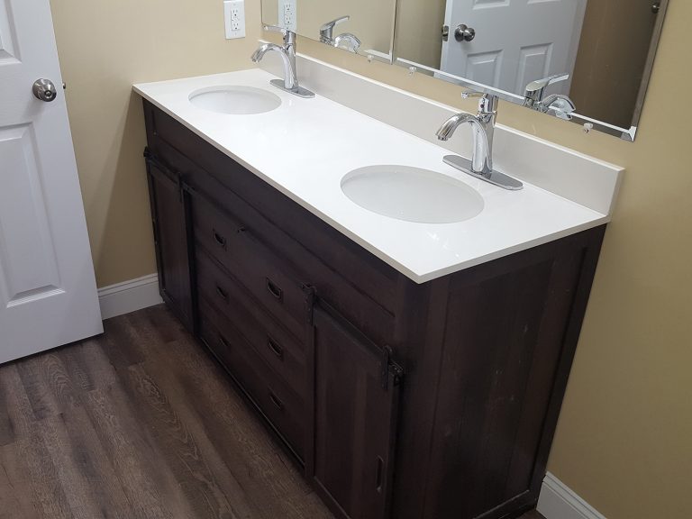 Renovated restroom installed with new double bathroom vanity