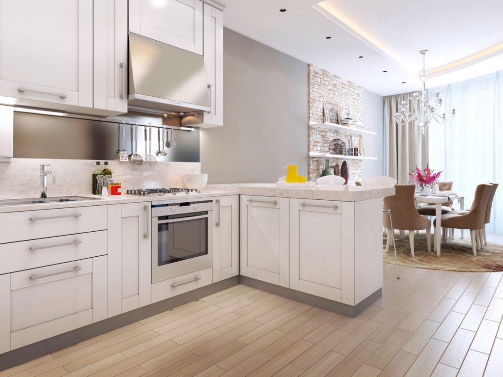 Newly renovated kitchen installed with laminate flooring