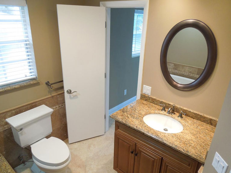 Upgraded restroom installed with granite bathroom sink