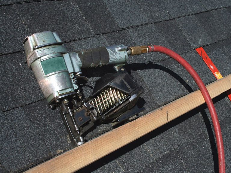 A metal roof tool use for installation called Coil Roofing Nailer