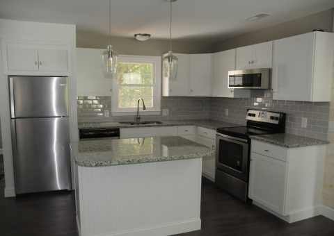 Freshly renovated kitchen installed with granite countertops