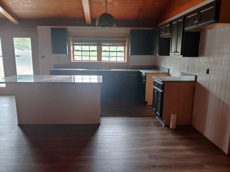New kitchen and flooring in log cabin home